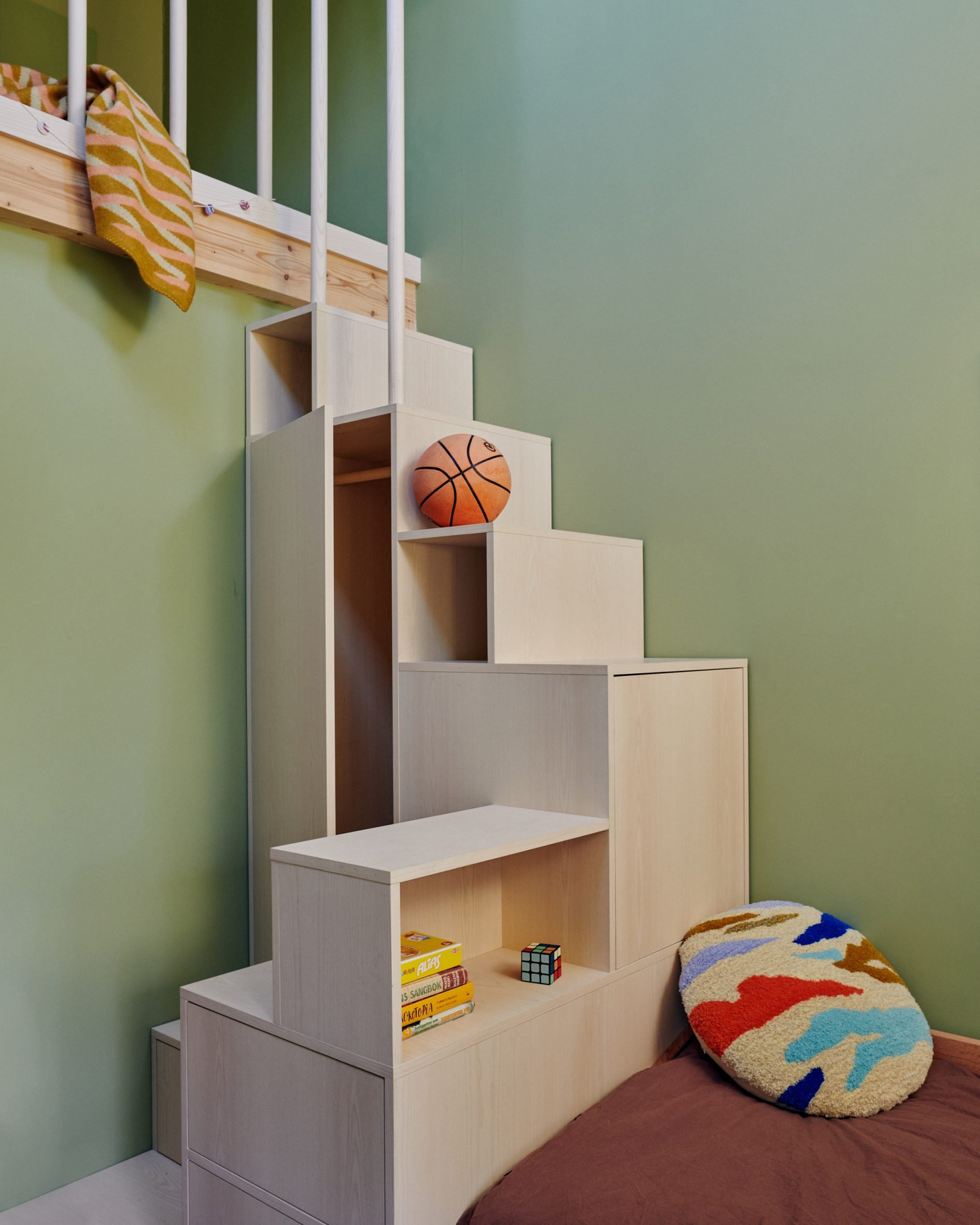 Staircase doubles as a shelving unit