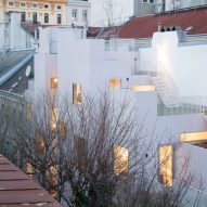 PSLA Architekten tops urban townhouse with cascading roof terraces