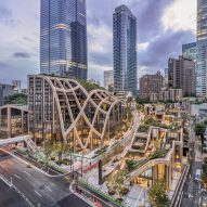 Heatherwick Studio unveils undulating district designed as "one of Tokyo's greenest urban areas"