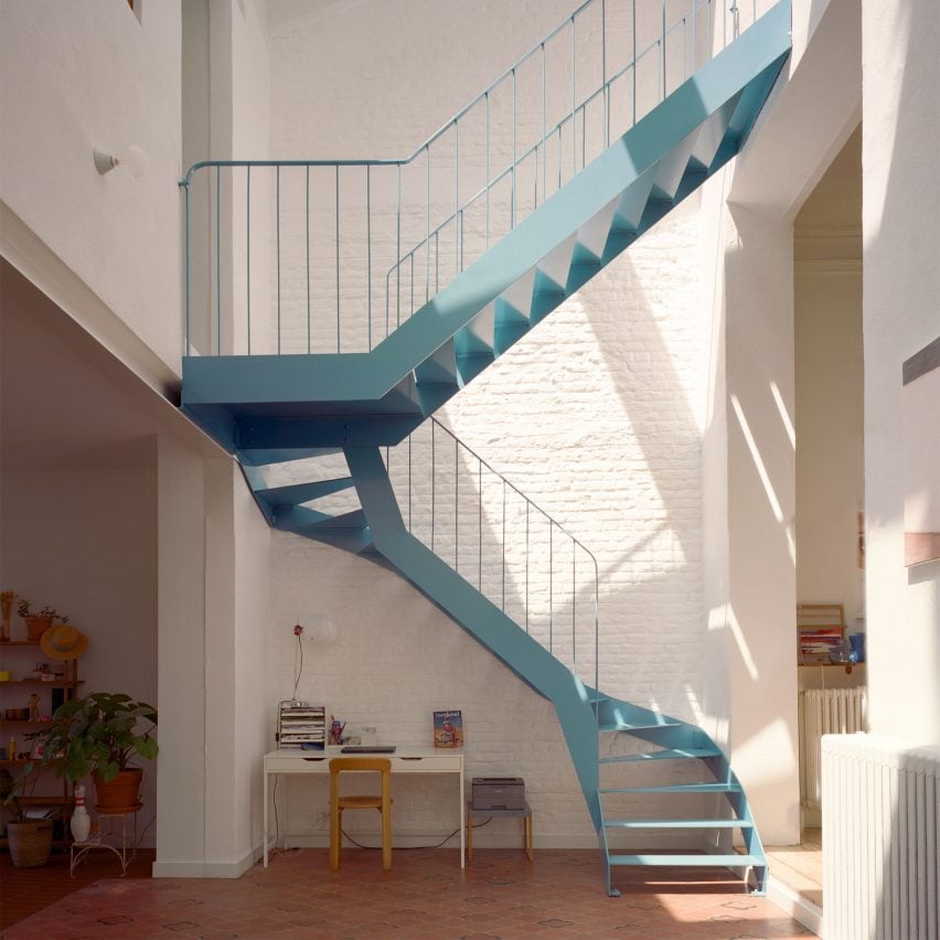 Blue metal staircase in an atrium