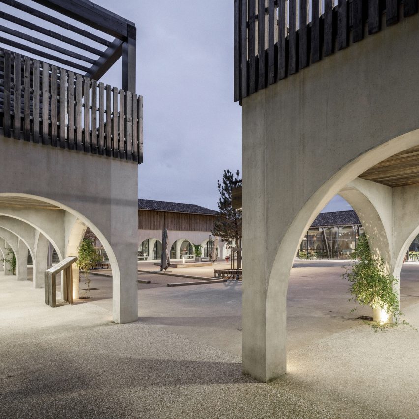 Arched colonnade at the Alzheimer's Village in France by NORD Architects