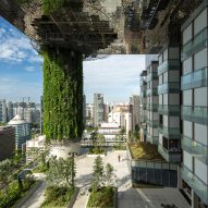 WOHA cuts garden terraces supported by green columns into Pan Pacific Orchard hotel
