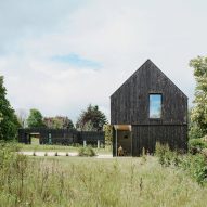 Loader Monteith adds charred-timber-clad office to brownfield site in Inverness