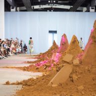 Spacon & X designs Stine Goya fashion show around crumbling sand towers