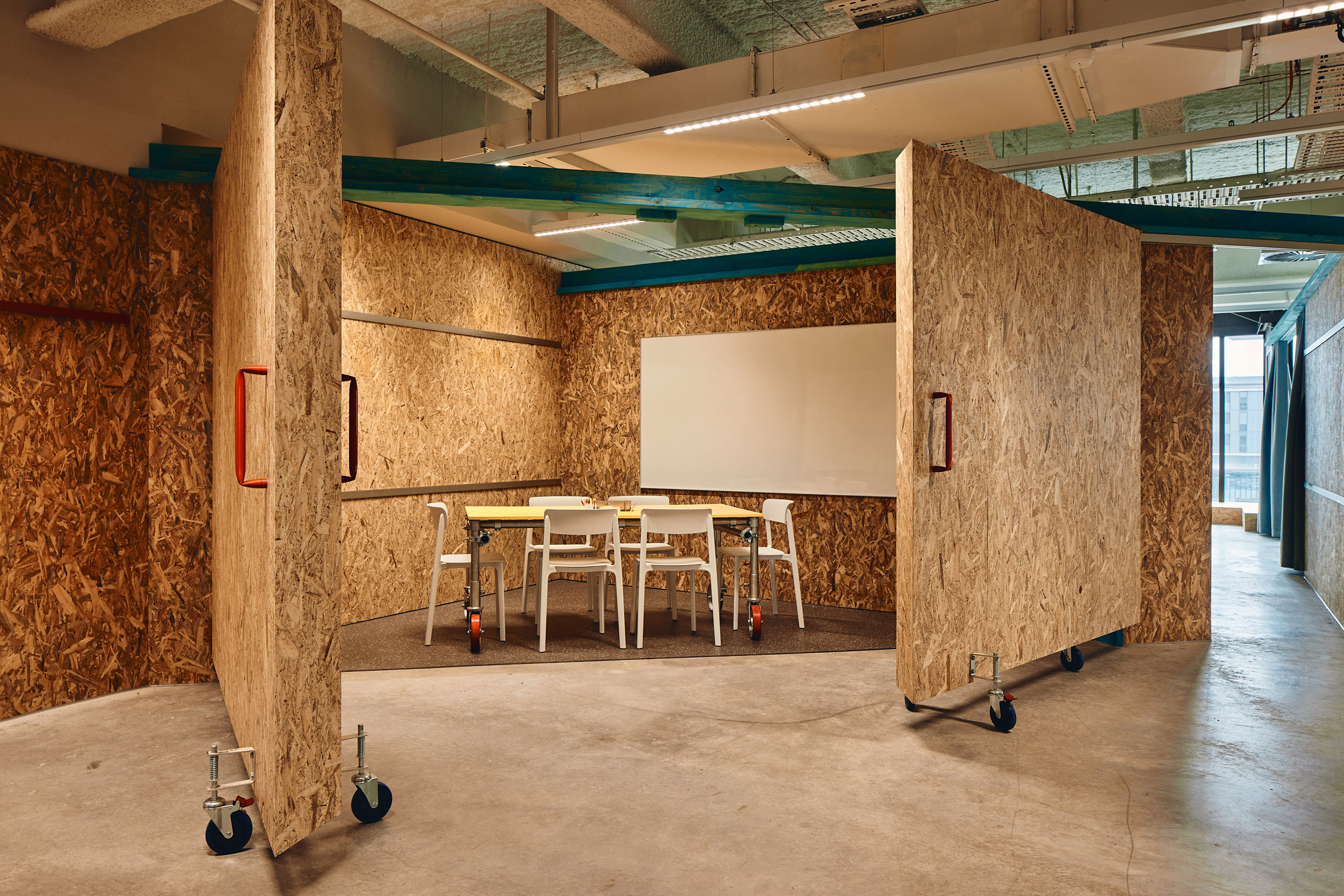 OSB partition walls on castors in Today Design office by Studio Edwards