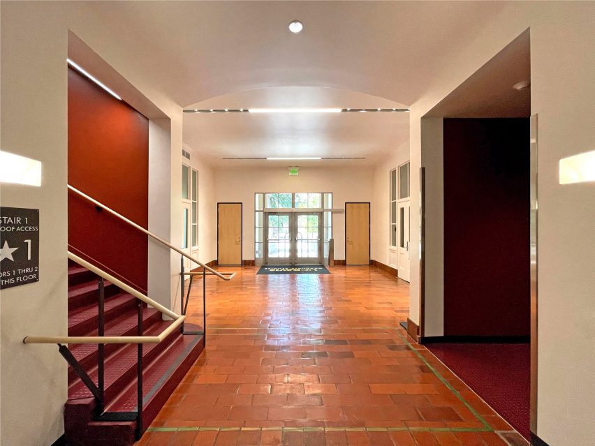 Lobby with red tiled flooring inside Walker Hall