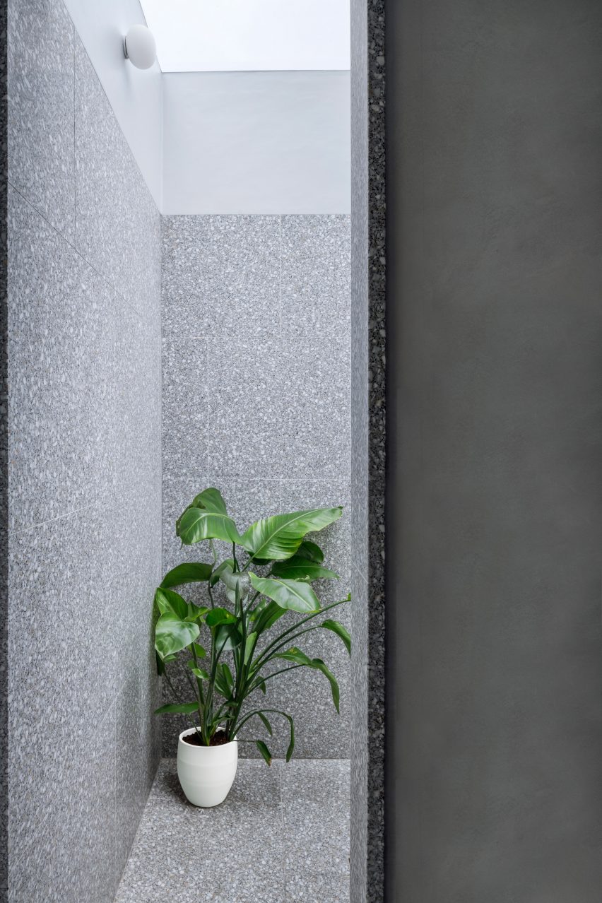 Grey tiles in bathroom designed by Gundry & Ducker