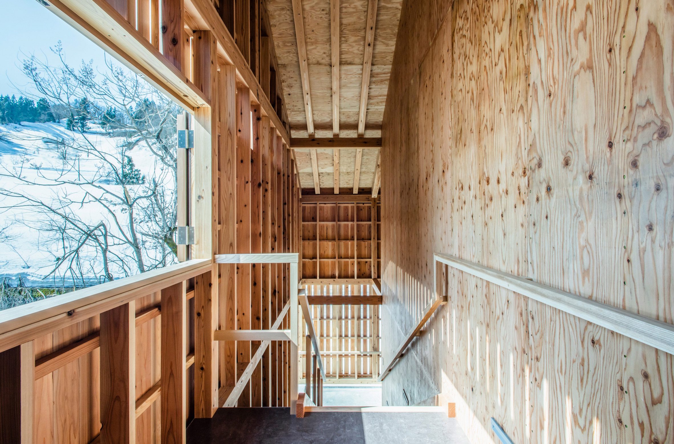Timber walkway inside Yukinohako snow-powered cool store