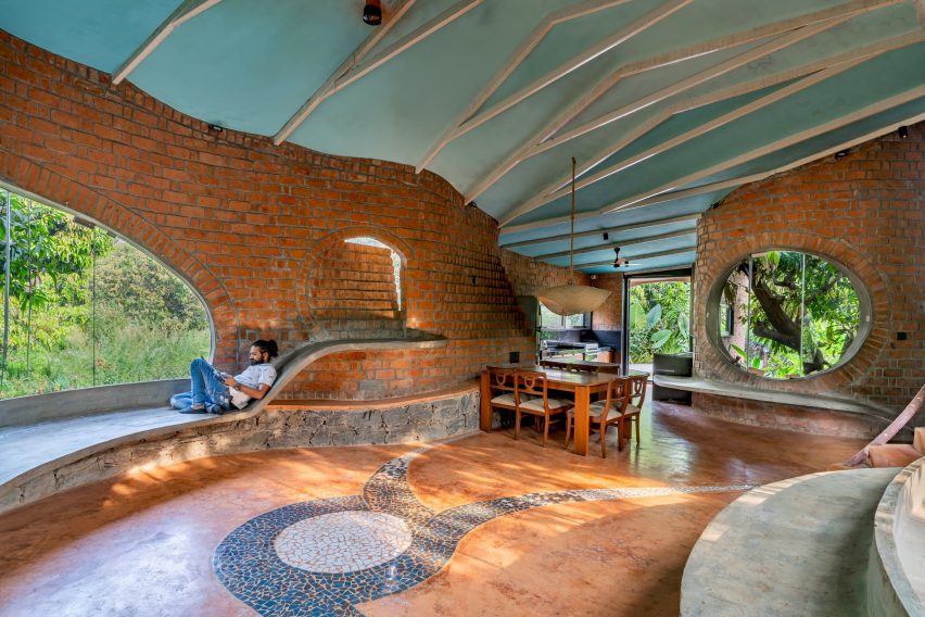 Brick home nestled in Indian forest near Mumbai