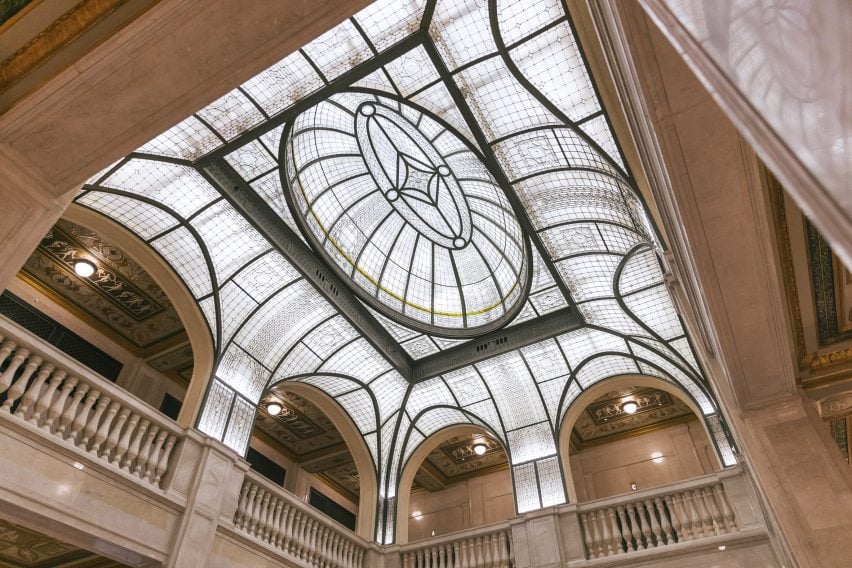Giant glass dome over a neoclassical lobby