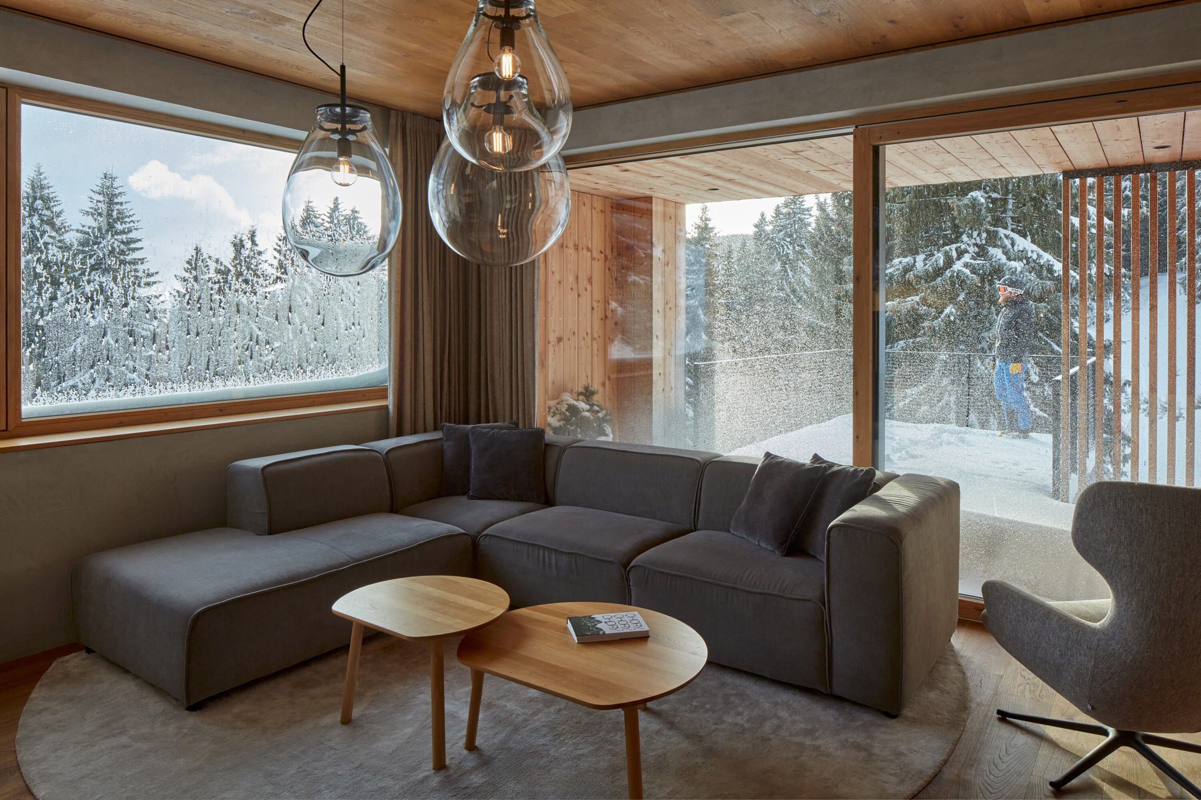 Living room with views over snowy landscape in Czech Republic