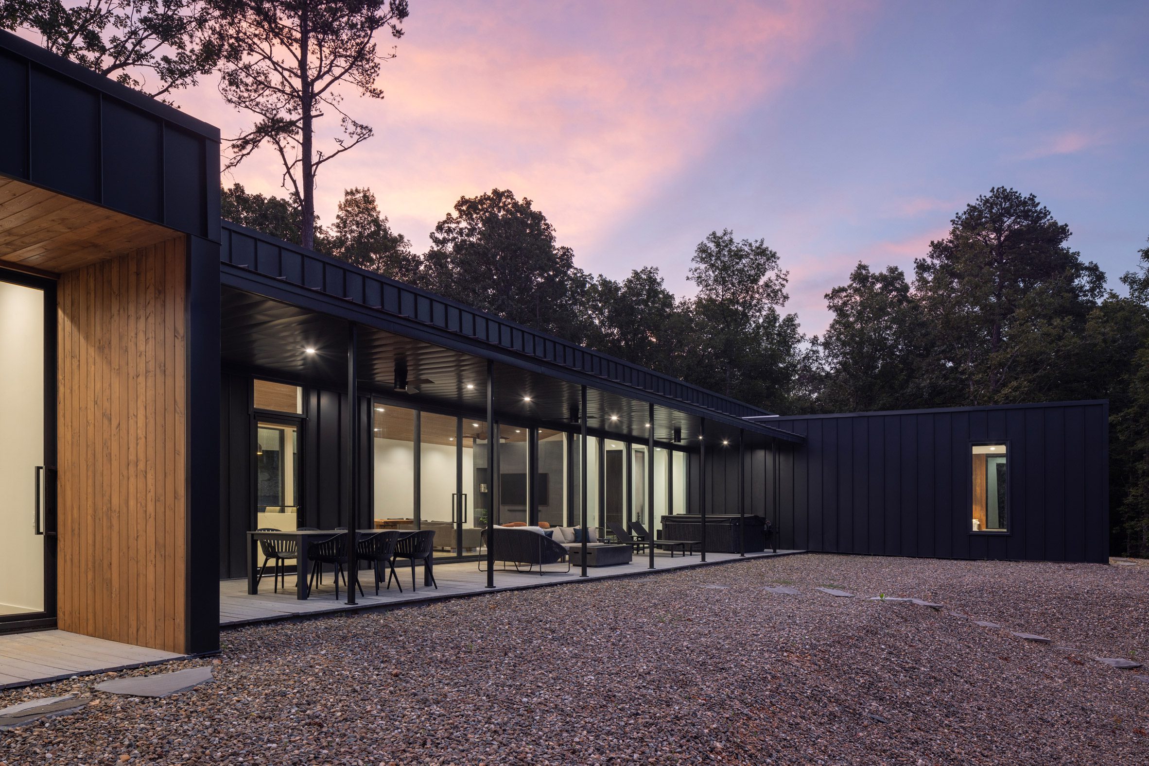 Patio and metal cladding of Oklahoma cabin by Far + Dang