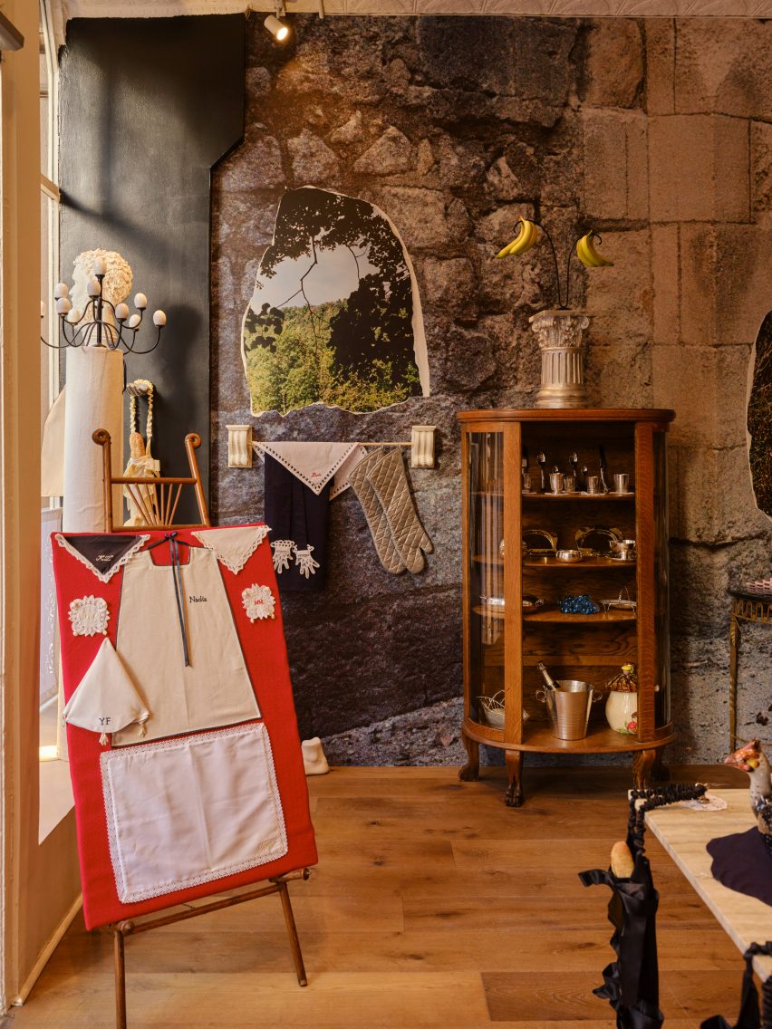 Homeware store interior with products displayed in vitrines and hung on the walls