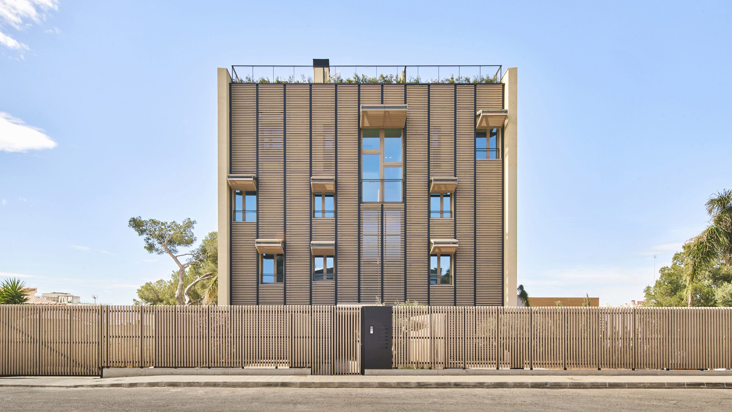 OHLAB encloses Mallorcan duplex apartments with dynamic shutters - Vimarsana News