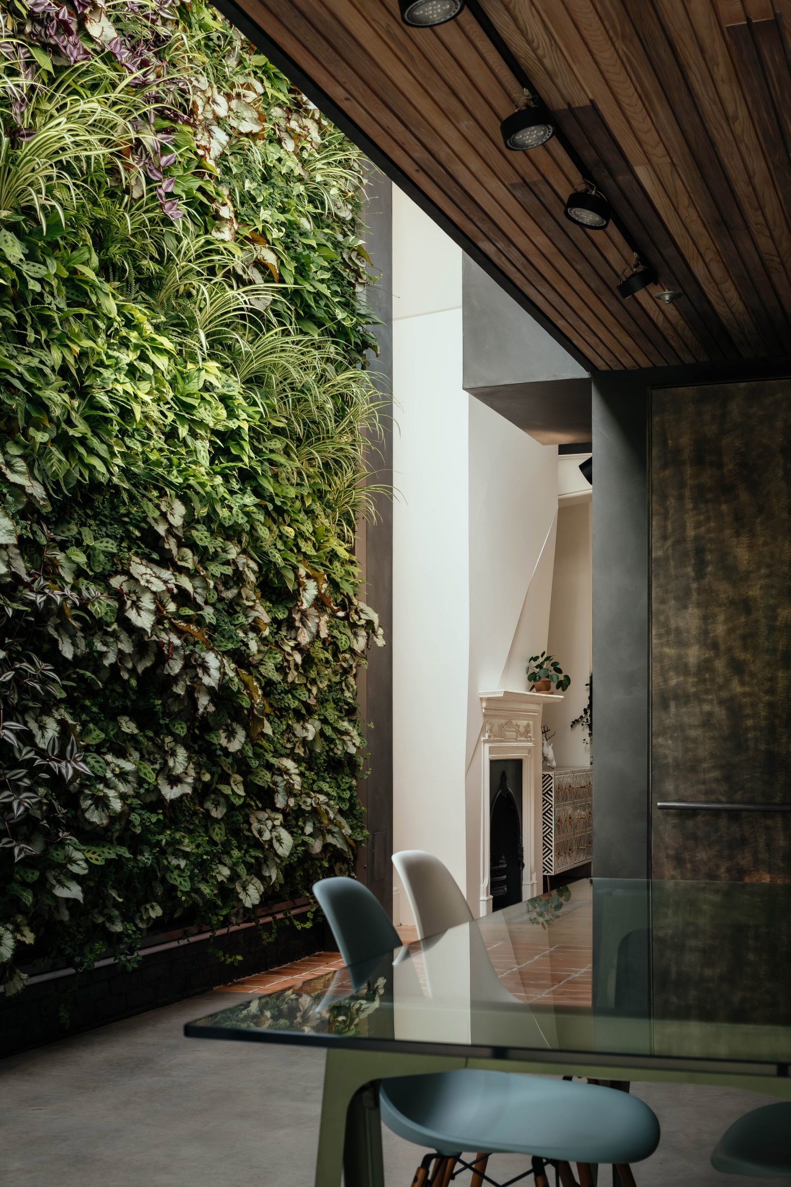 Green wall inside House of the Elements by Neil Dusheiko Architects