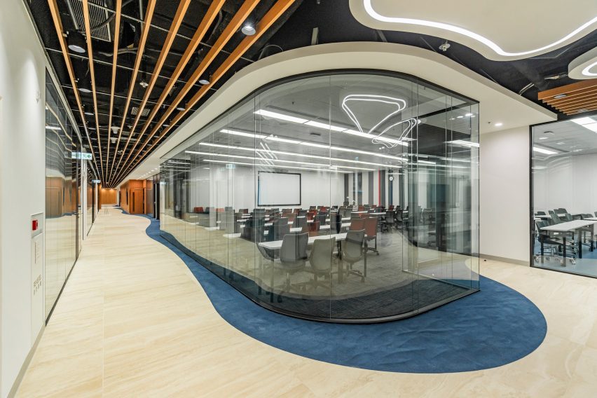 Photo of curved glass room partitions by JEB at the University of Wollongong (UOW) College Hong Kong campus in Tai Wai