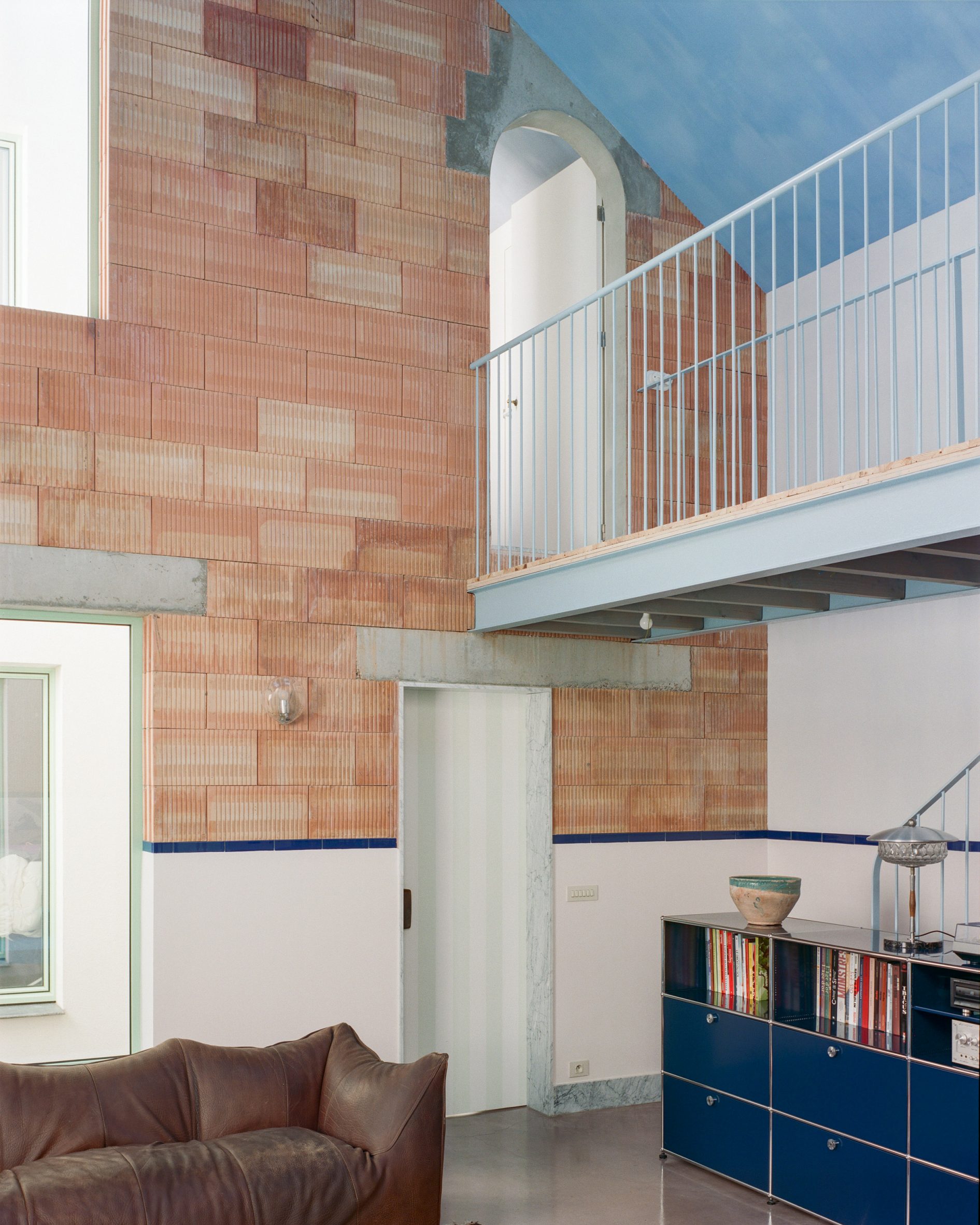 Ceiling and brick wall in house by Mamout
