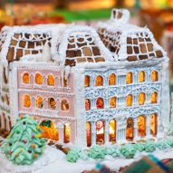 a gingerbread facade covered in icing and piping