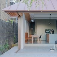 Proctor & Shaw tops London home extension with serrated zinc roof