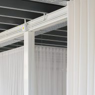 white curtains hanging from ceiling