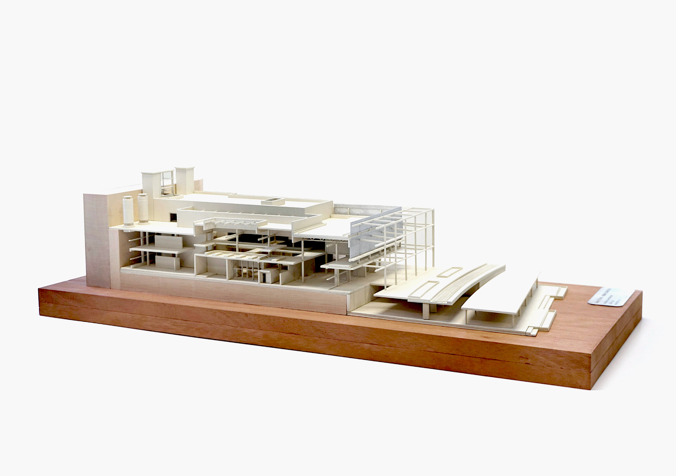 White architectural model on wooden base