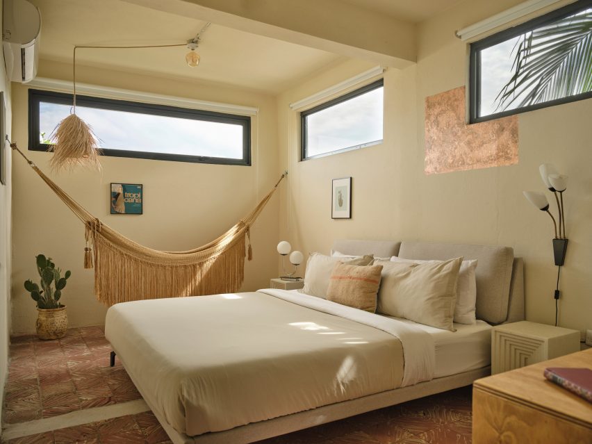 Neutral-hued bedroom with a hammock
