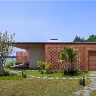 Villa in rural Vietnam uses local materials to "harmonise with the environment"
