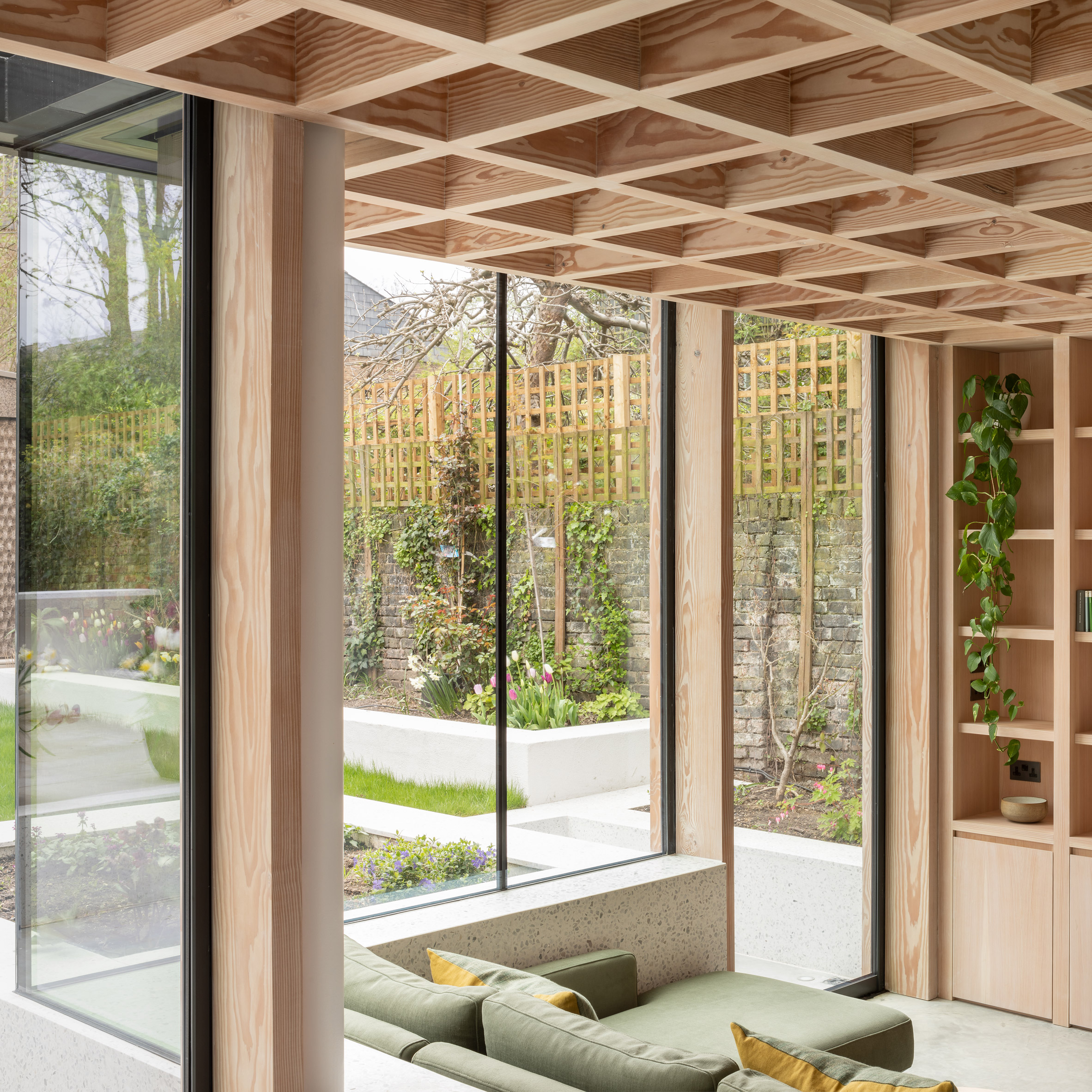 Home extension with a wood lattice ceiling