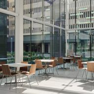 an eating area in a glass building