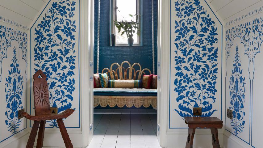 Photo of room with blue printed walls