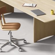Beige swivel chair in front of desk