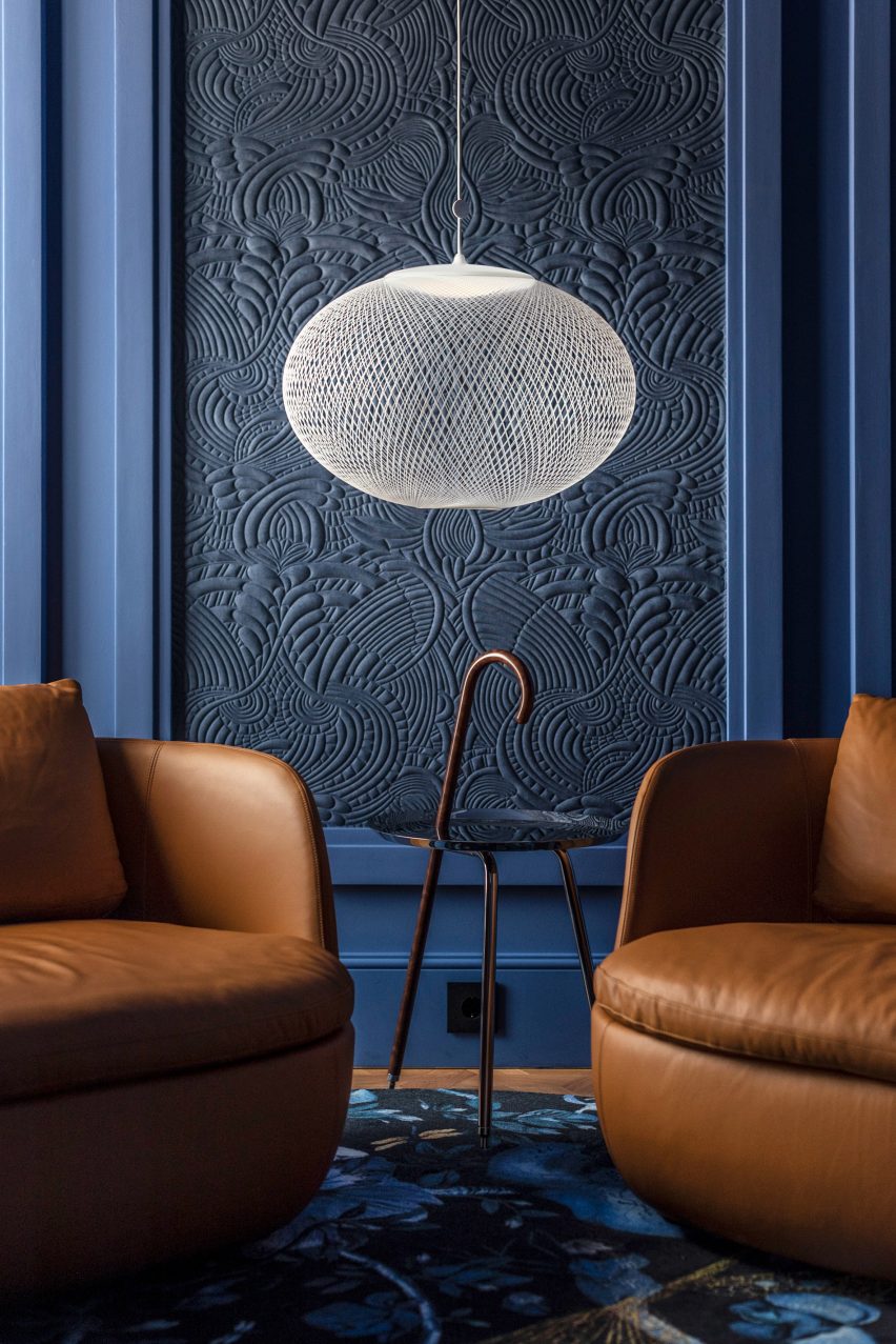 A room with a blue colour scheme and Moooi furnishings in Lisbon's Art Legacy Hotel