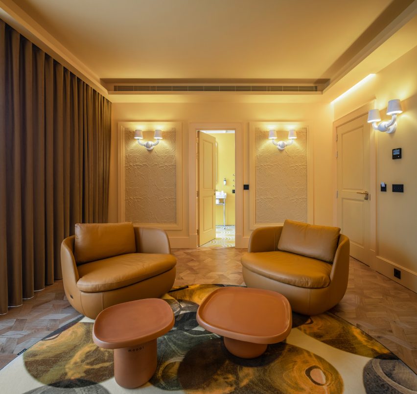 A suite with a yellow colour scheme in the Art Legacy Hotel in Lisbon