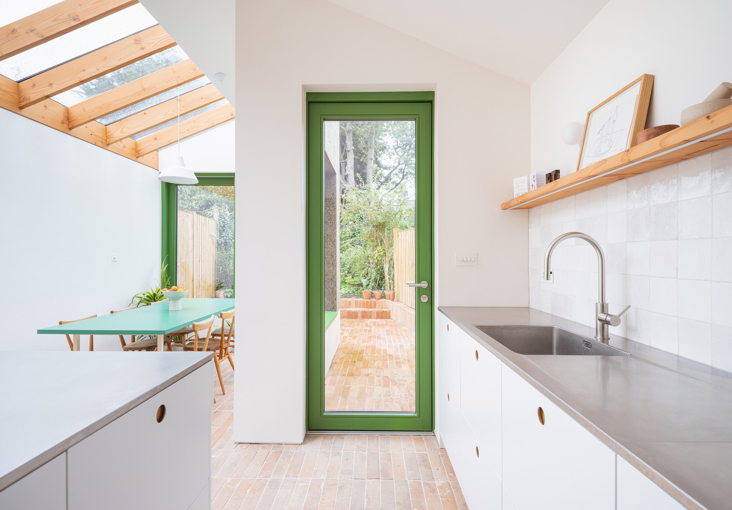 Brick floor inside Camberwell Cork House by Delve Architects