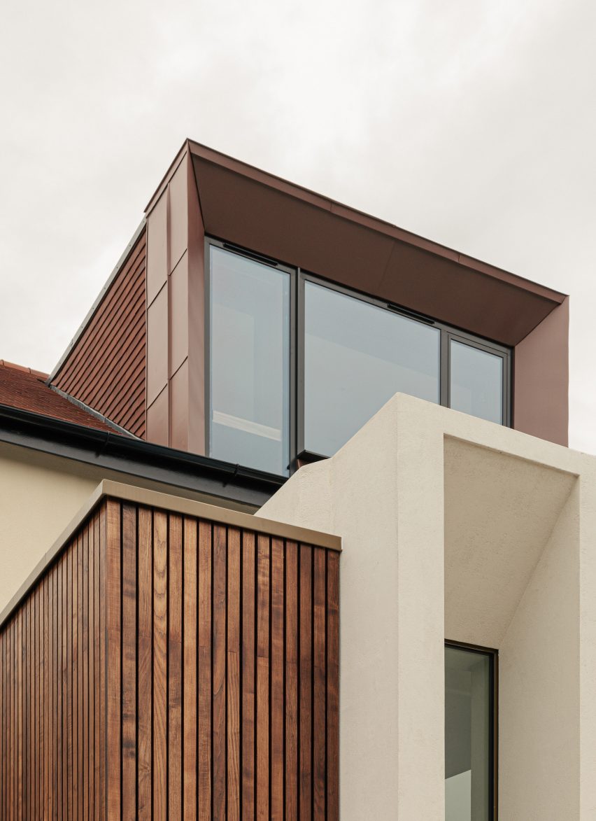 Brown ash slats, dormer and colonnade in Colonnade by Will Gamble Architects in Croydon, London