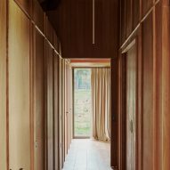 Wood-lined corridor in a clubhouse