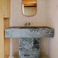 Stone sink in a wood interior