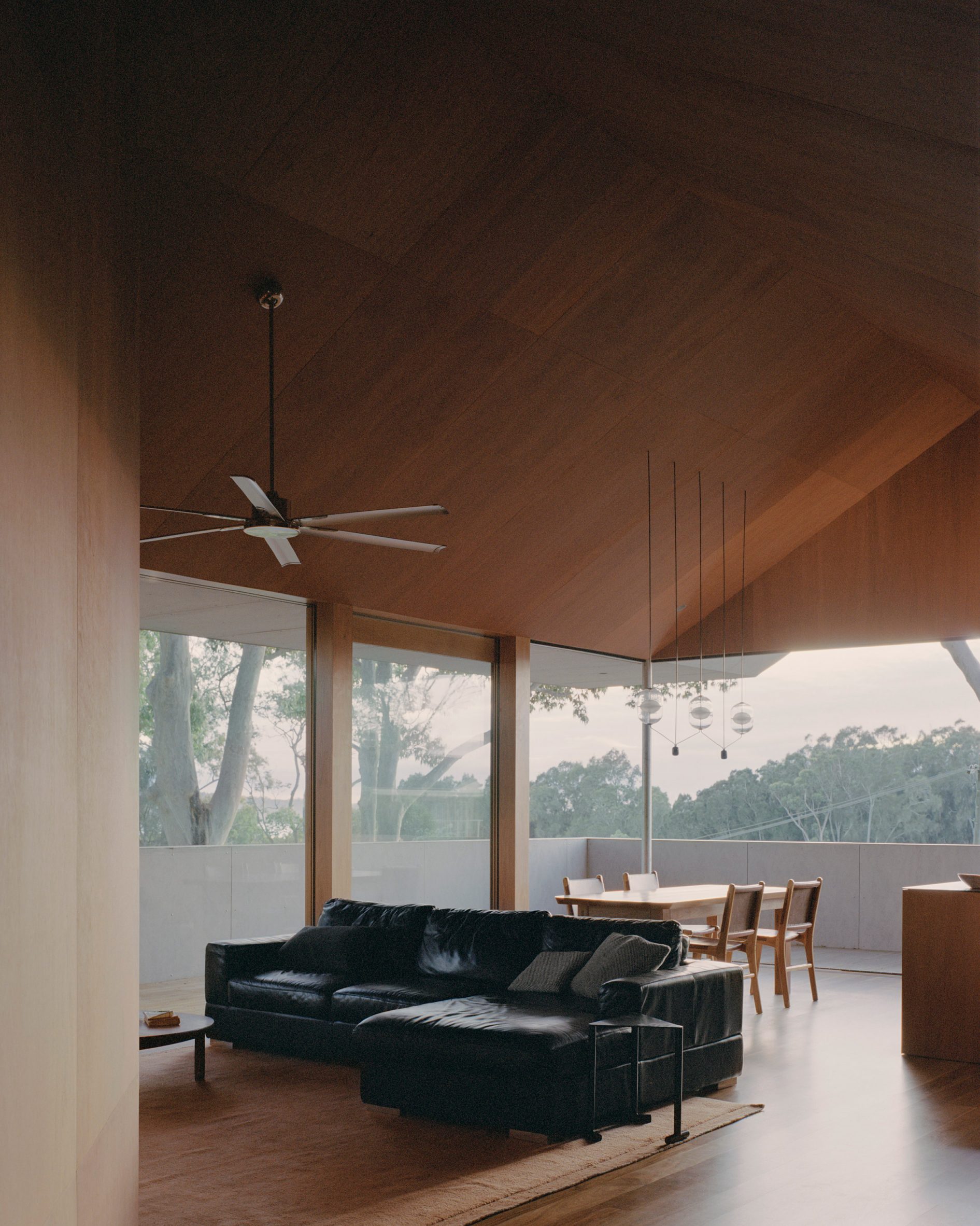 Wood-clad living room of Mossy Point in New South Wales by Edition Office