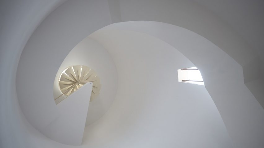 Spiral staircase from below inside El Faro lighthouse Mexico