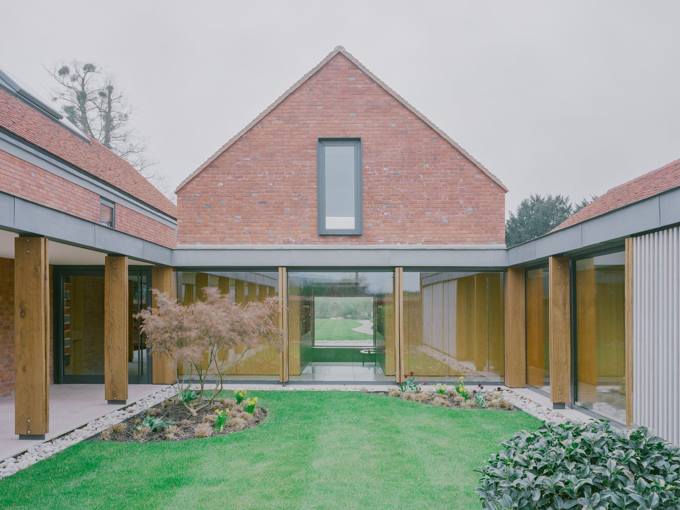 Open courtyard in Lowater in Marlow, UK by Fletcher Crane Architects