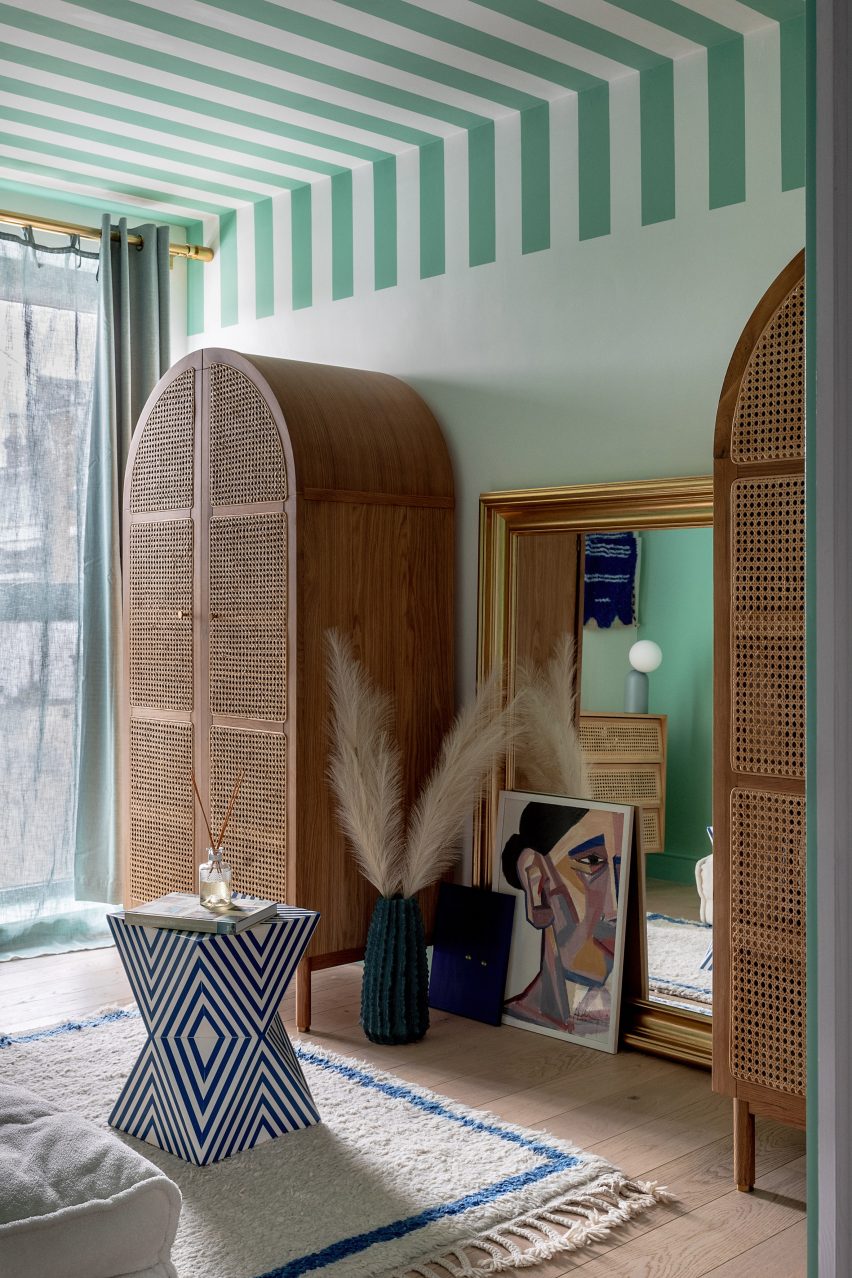 Arched wardrobes and striped ceiling in Moroccan-inspired townhouse by PL Studio