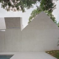 Concrete exterior wall of FR House in the Philippines by CAZA