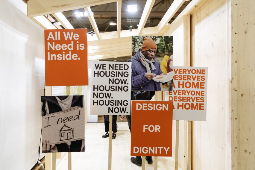 Picket signs with slogans related to housing justice