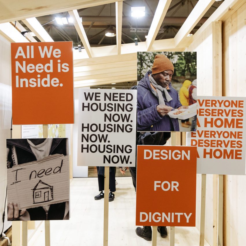 Picket signs with slogans related to homelessness