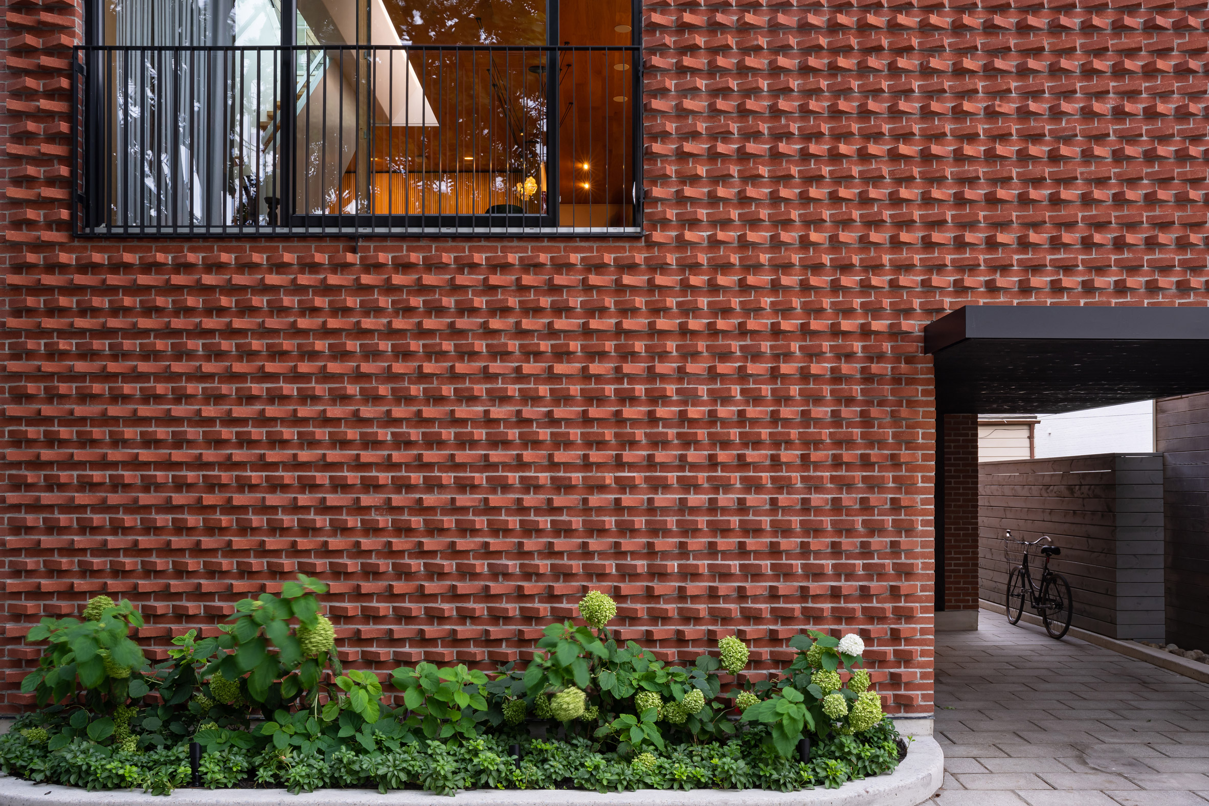 Brick-clad facade of laneway house