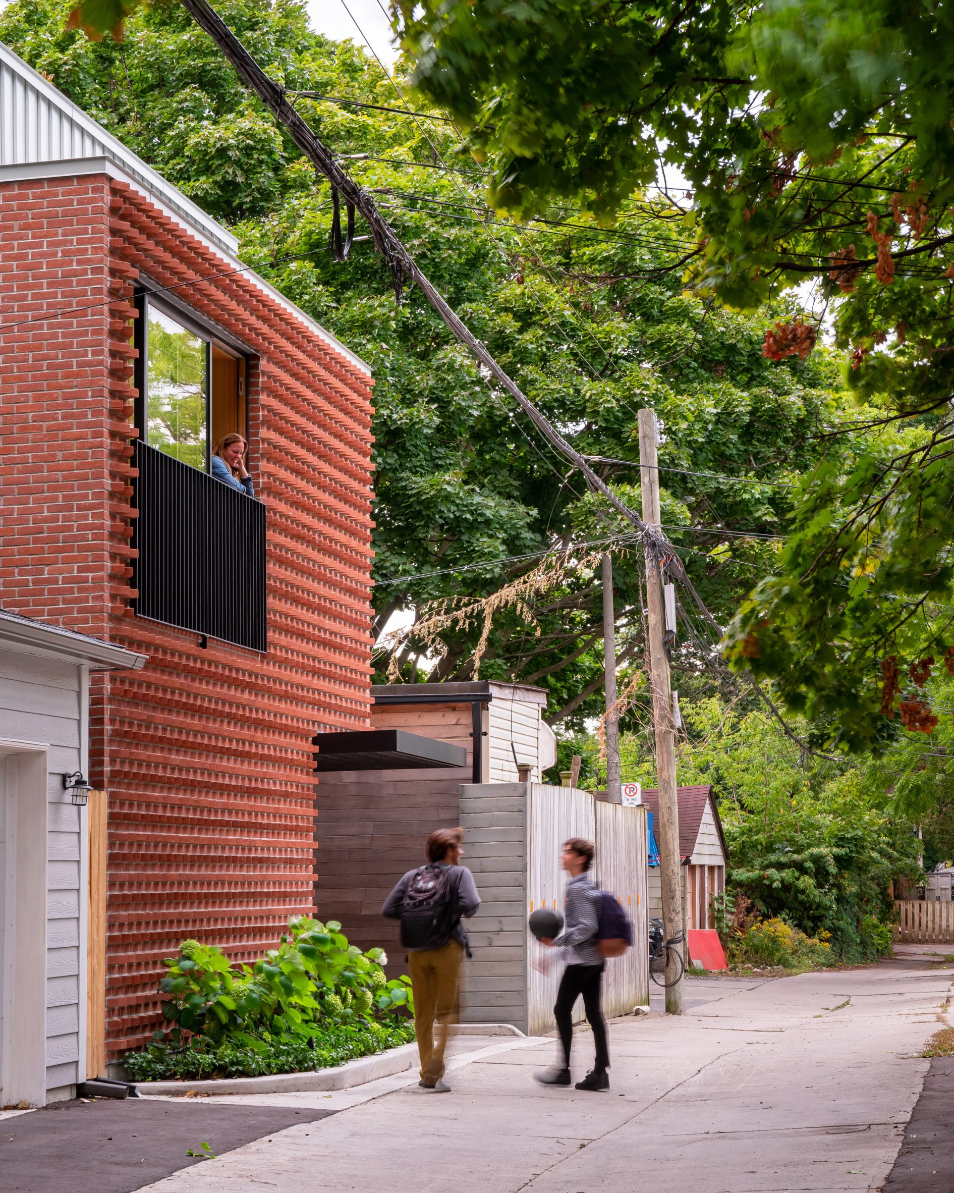 Brick-clad laneway house in Toronto