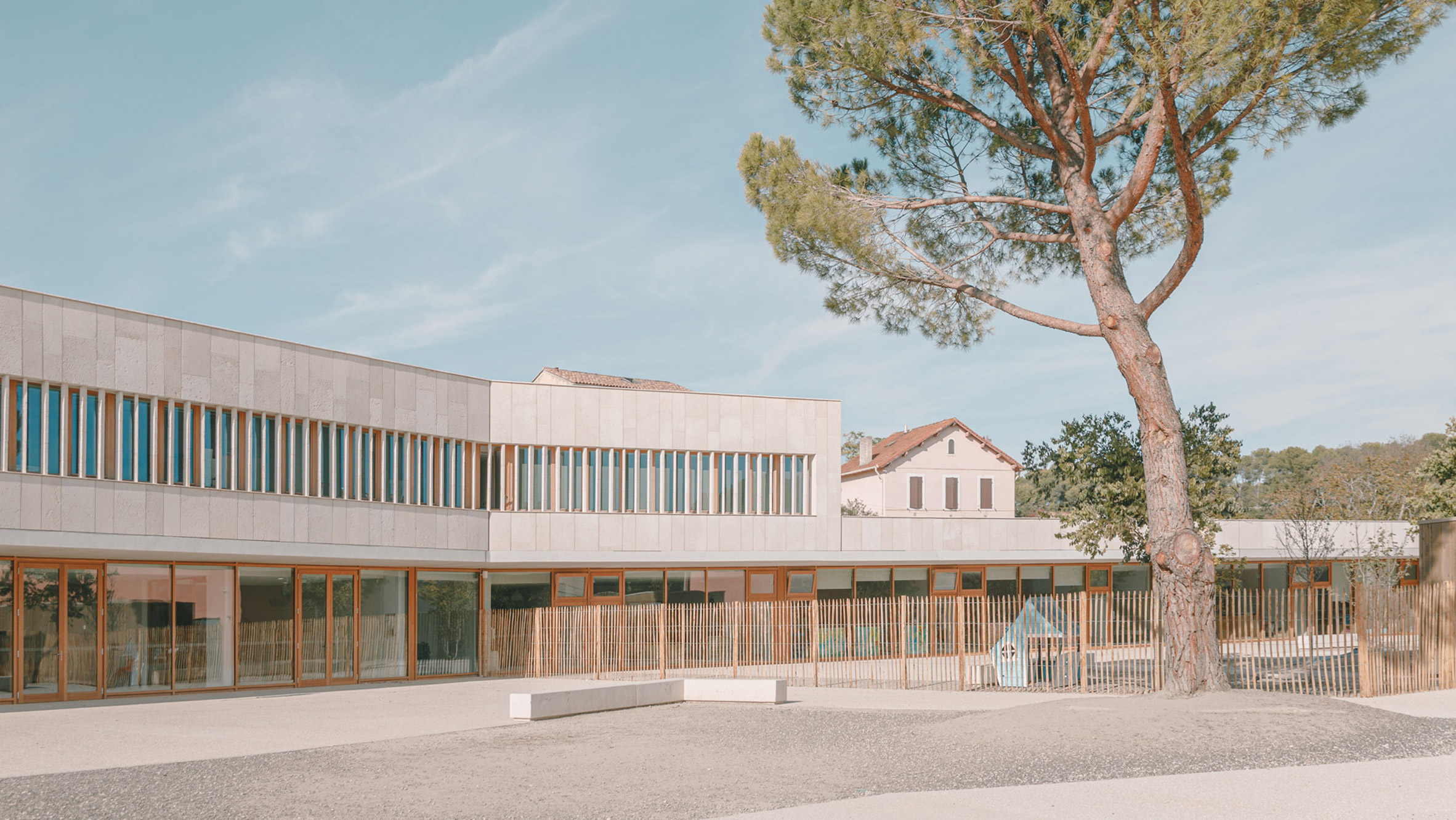 Amelia Tavella Architectes completes limestone-clad school in France - Vimarsana News