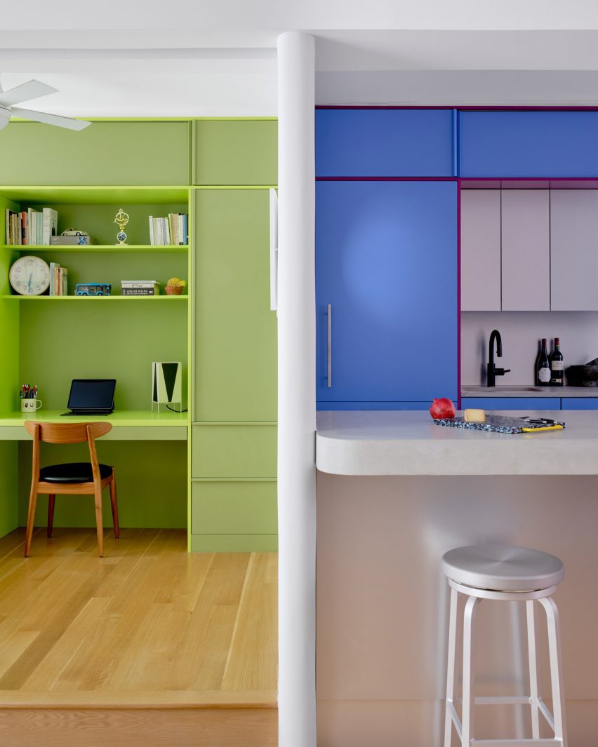 Lime green bedroom to the left and blue kitchen to the right