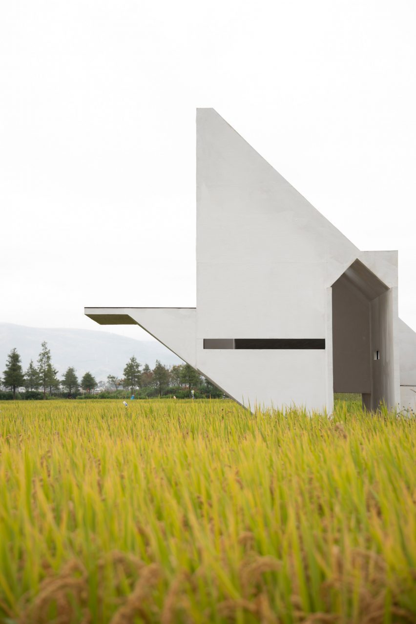 The angular form of Concrete Pavilion by Lin Architecture in rural China