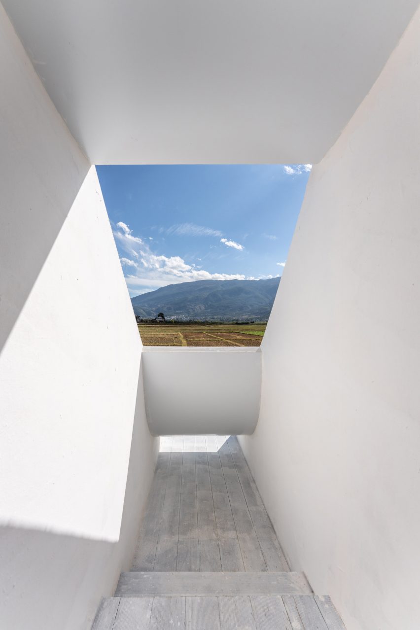 Irregular openings in Concrete Pavilion by Lin Architecture in rural China